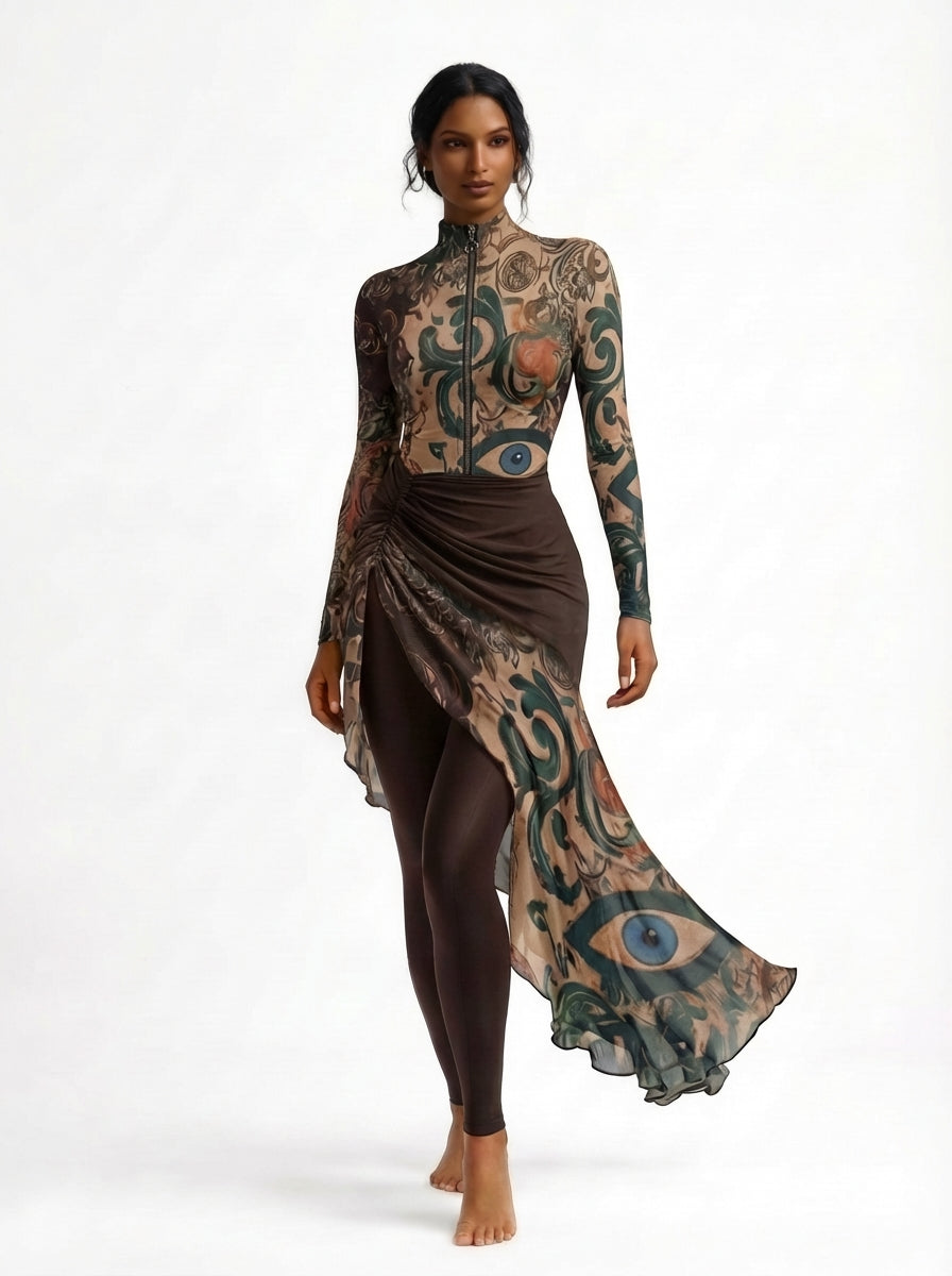 Woman wearing a long-sleeve dress with intricate patterns on a white background