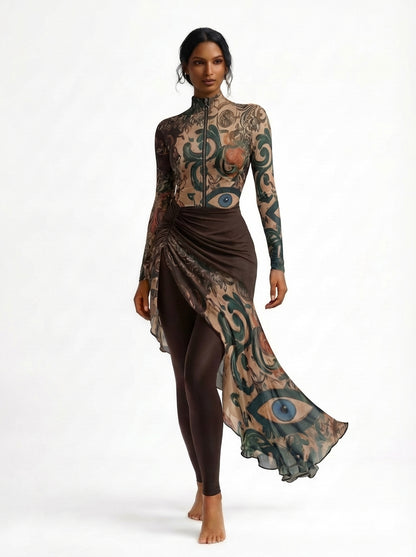 Woman wearing a long-sleeve dress with intricate patterns on a white background